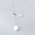 Collar a capas con colgante de monedas