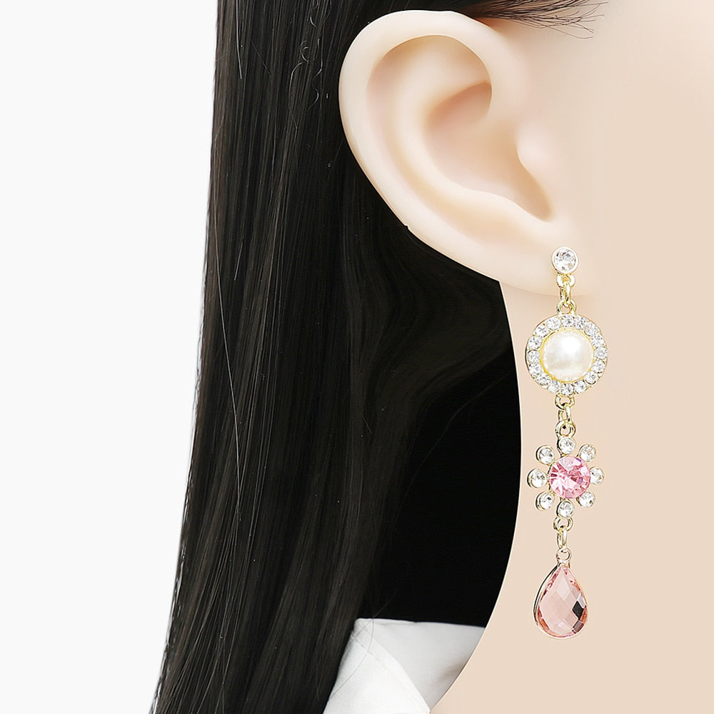Pendientes largos con cristal rosa en forma de gota
