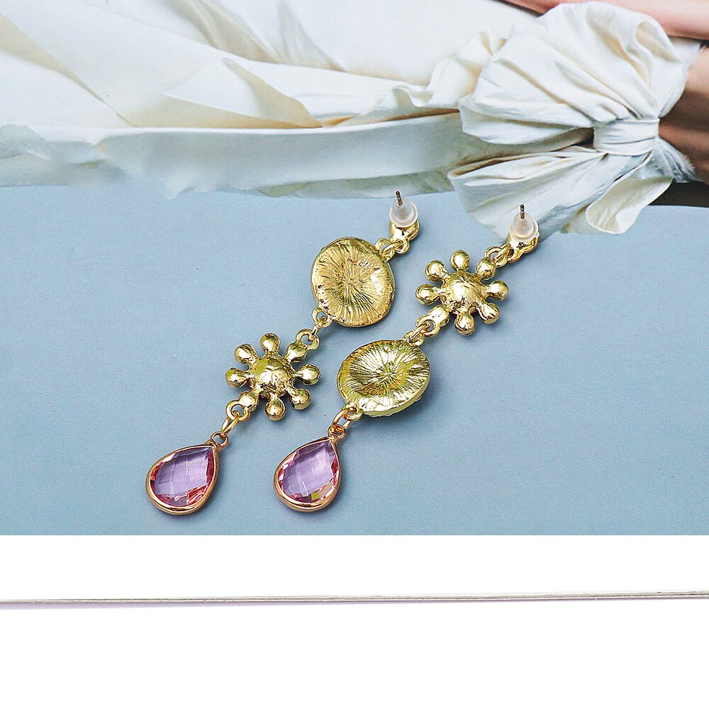 Pendientes largos con cristal rosa en forma de gota