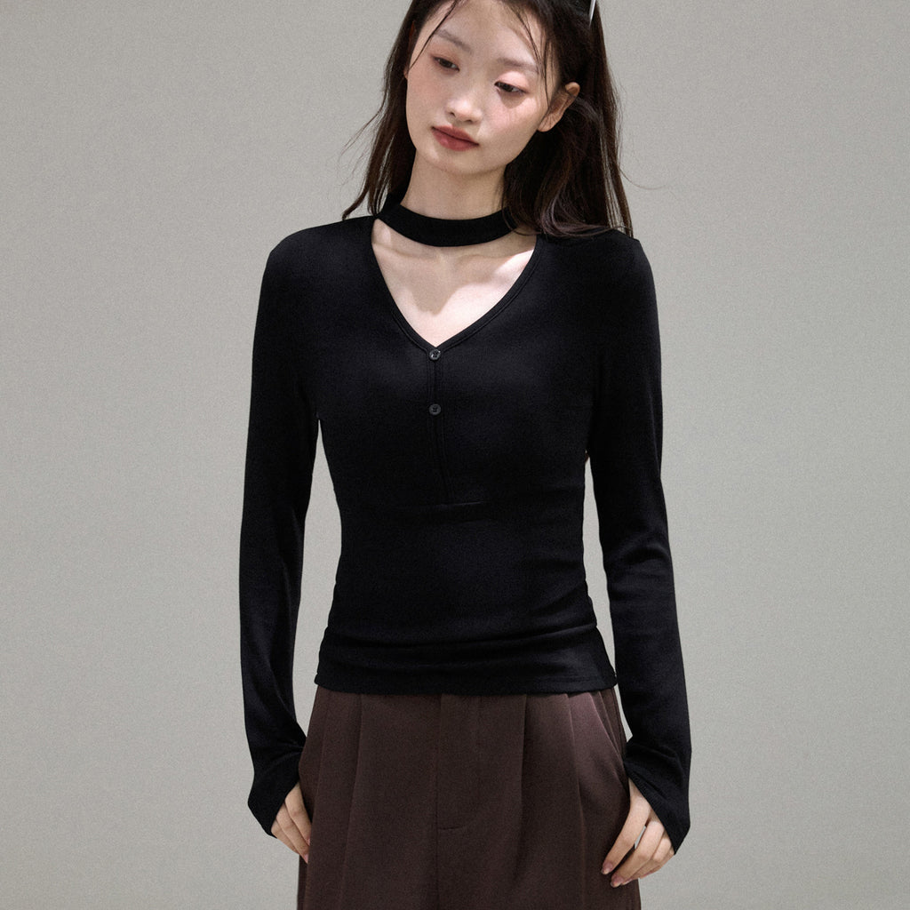 Top de Manga Larga con Cuello Halter en V y Estética de Diseño