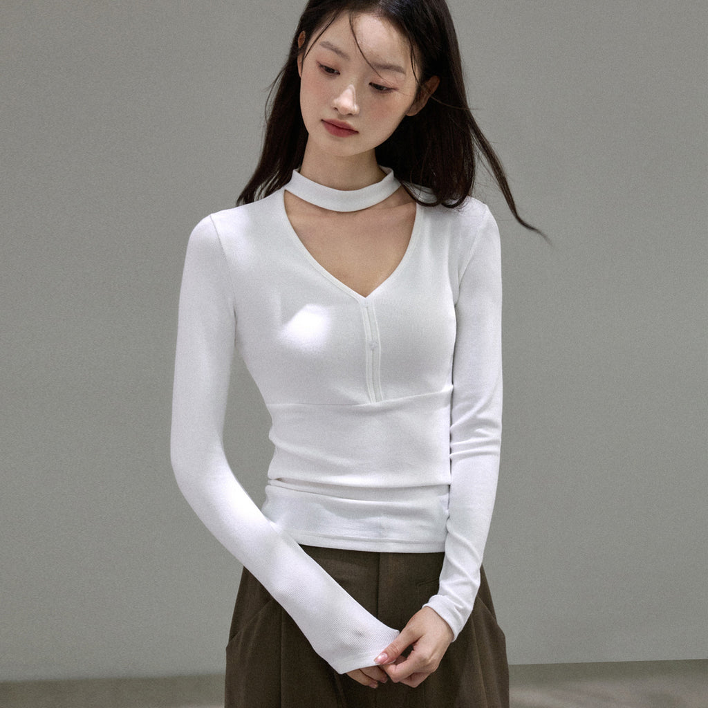 Top de Manga Larga con Cuello Halter en V y Estética de Diseño