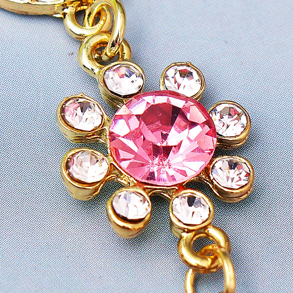 Pendientes largos con cristal rosa en forma de gota