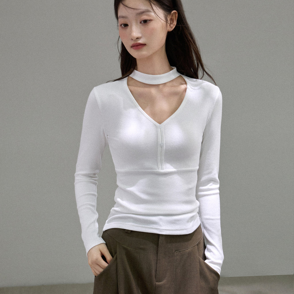 Top de Manga Larga con Cuello Halter en V y Estética de Diseño