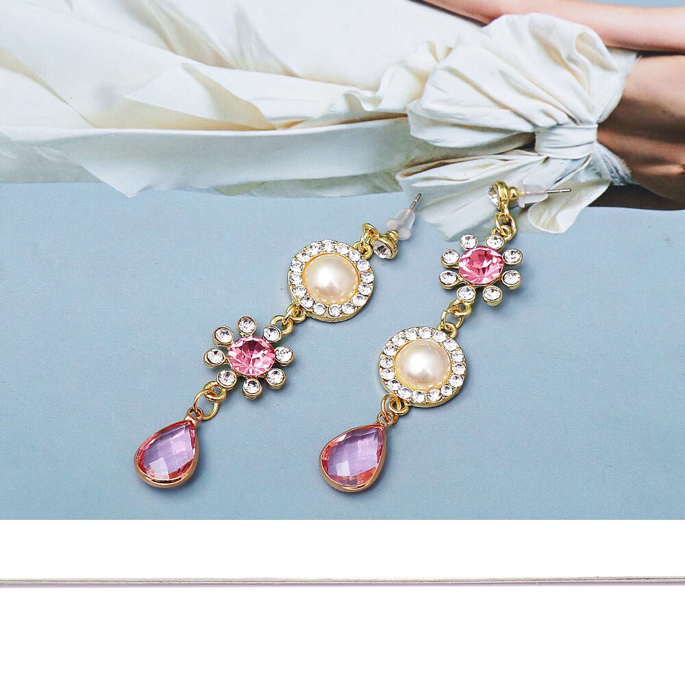 Pendientes largos con cristal rosa en forma de gota