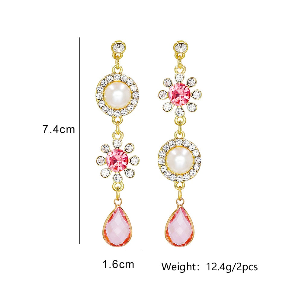 Pendientes largos con cristal rosa en forma de gota